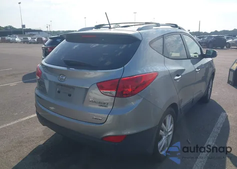 2012 Hyundai Tucson Limited from USA, damaged, VIN KM8JUCAC3CU381838